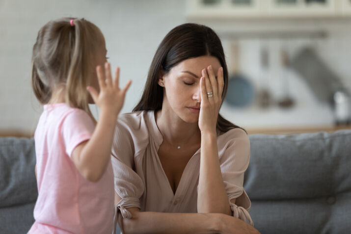 tired single mother feel desperate about screaming kid daughter