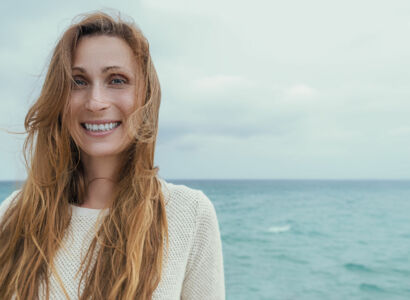 71326730 coast portrait of laughing woman